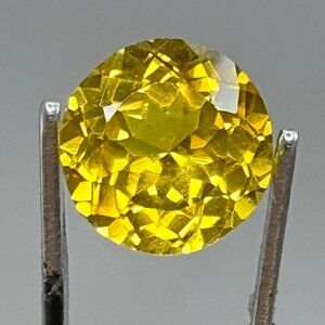 Certified Daisy Yellow Sapphire (Inclusions)